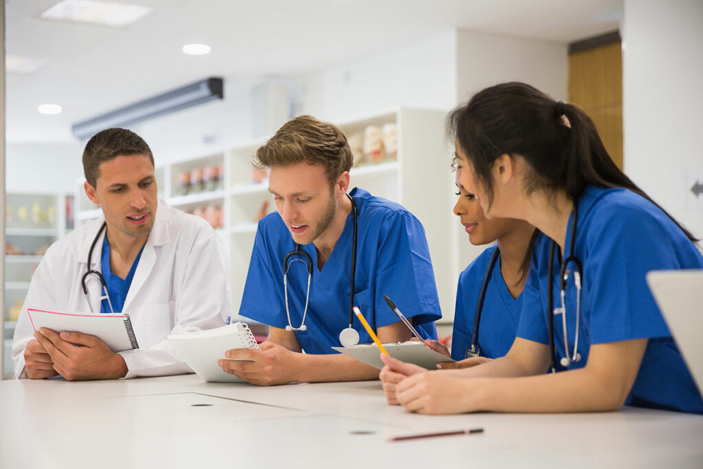 physicians and assistants in a middle of a medical scribe job interview